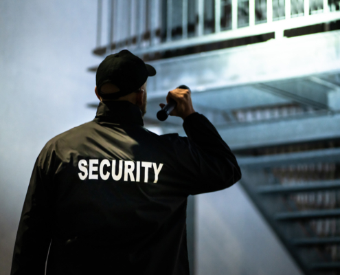 Security Guard Walking Building Perimeter