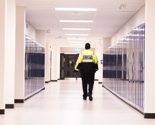 Security Guard Walking Halls At School