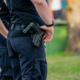 Police Officers On Duty At Public Event, Armed Law Enforcement