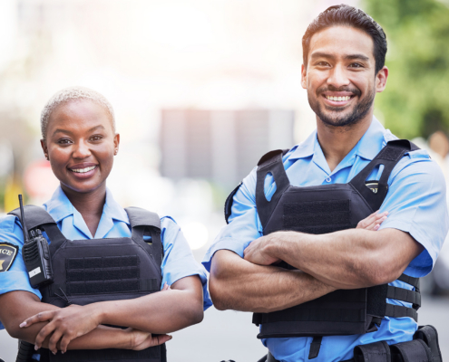Two Security Officers Smilng
