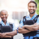 Two Security Officers Smilng