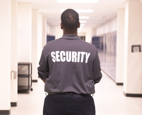 Security Guard Patrolling At School